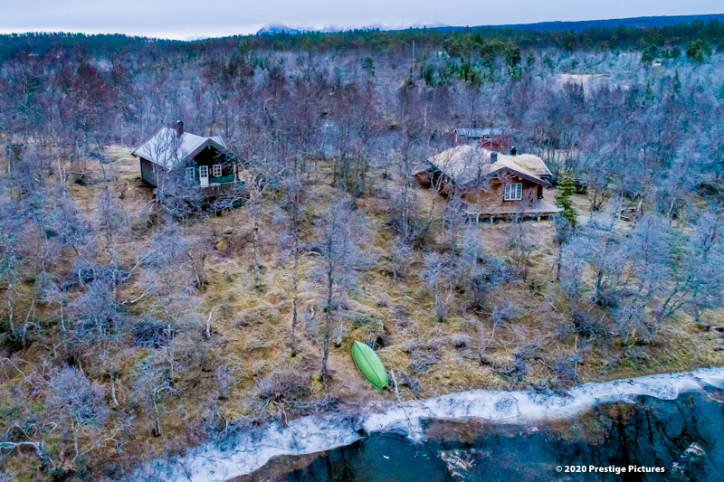 Small houses by a lake in Arctic Norway ©Prestige Pictures